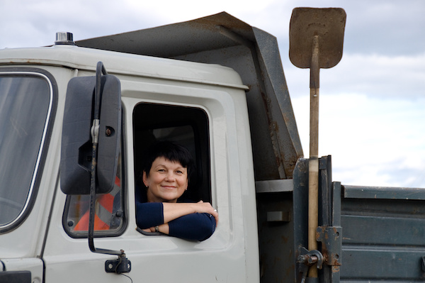 the woman behind the wheel of a truck